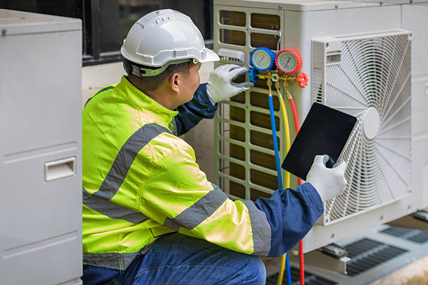 Professional Emergency Hvac Repair technician working in Rhode Island, RI